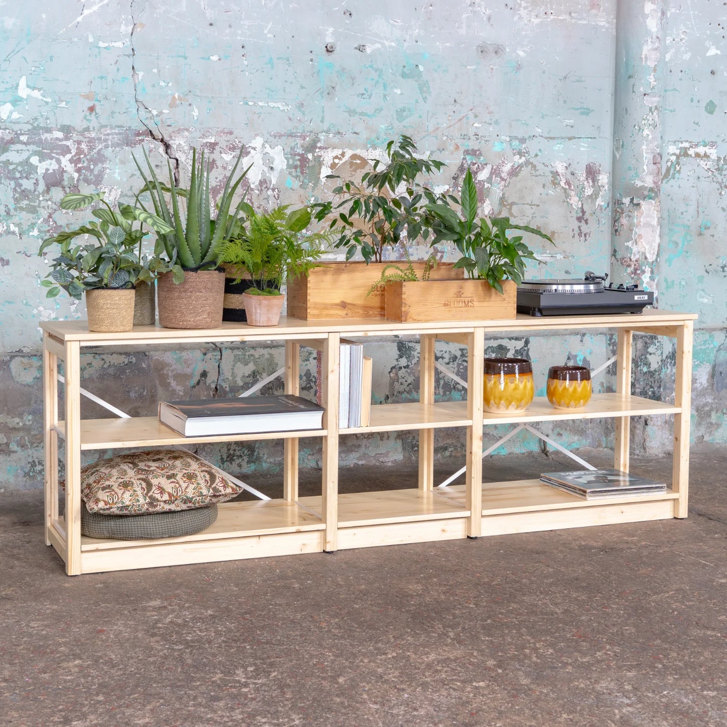 Sideboard | Lundia Original | Clear lacquered solid wood with plants, books and ceramics