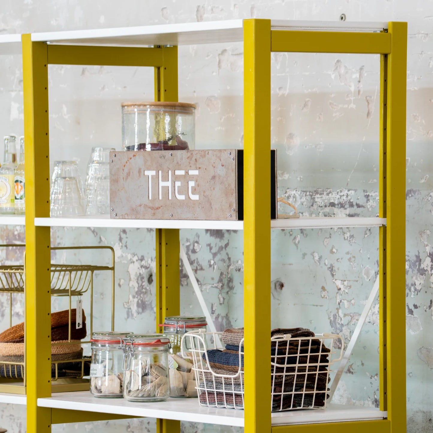 Low bookcase | Lundia Original | Mustard Green solid wood with shelves filled, side view