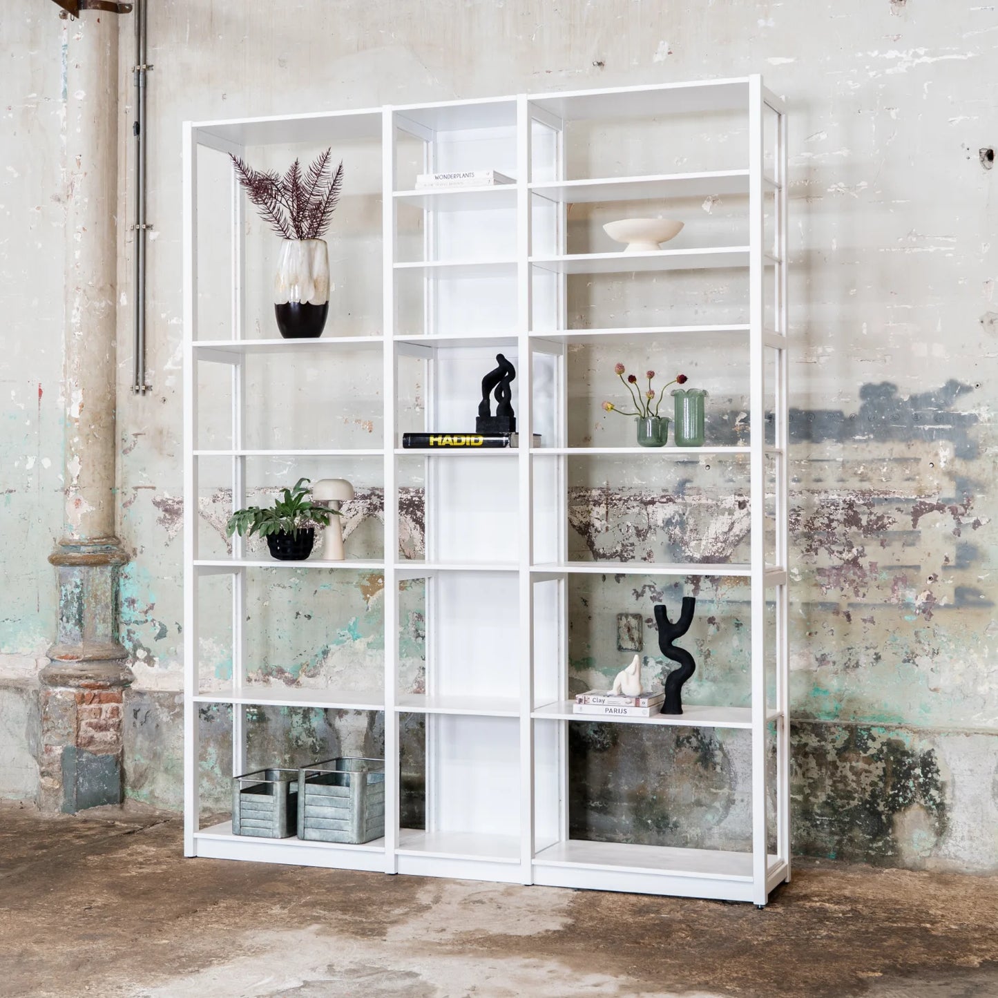 Wall cabinet | Lundia Original | Signal white solid wood with books, plants and sculptures